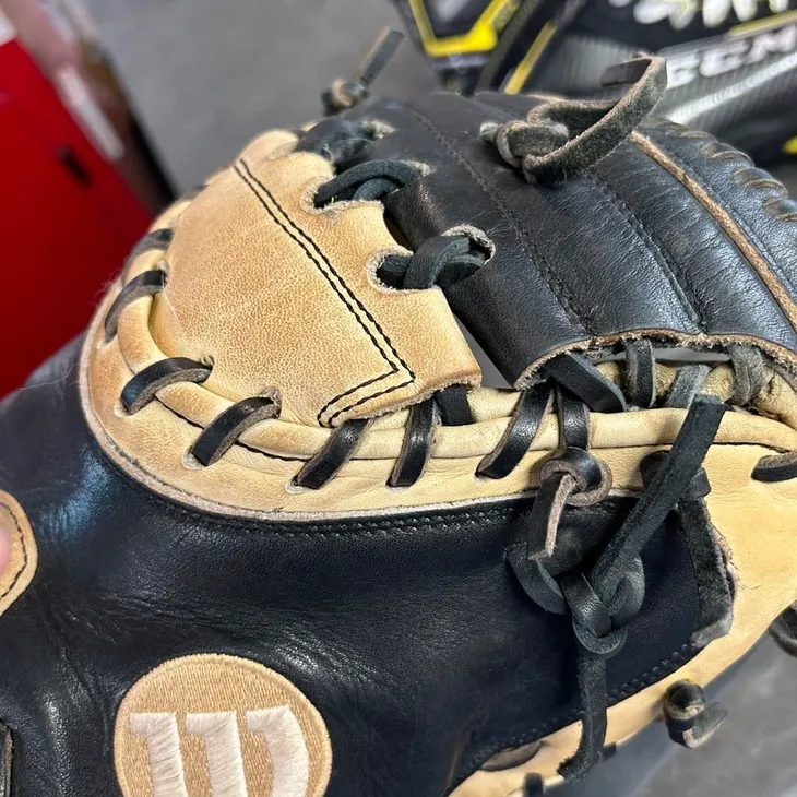 Leather glove stitching and lacing at Skate Tech