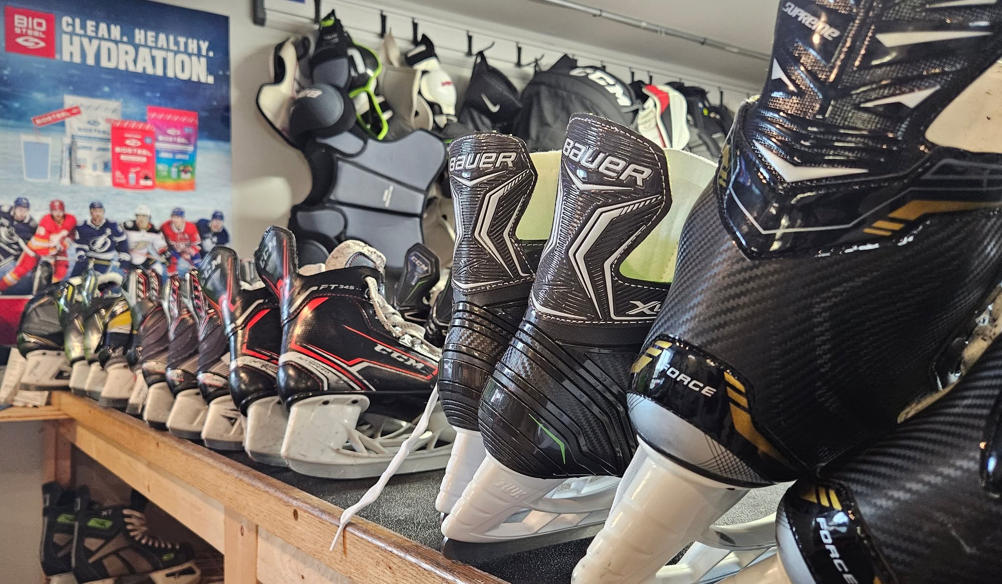 Hockey skates lined up at the Skate Tech shop counter