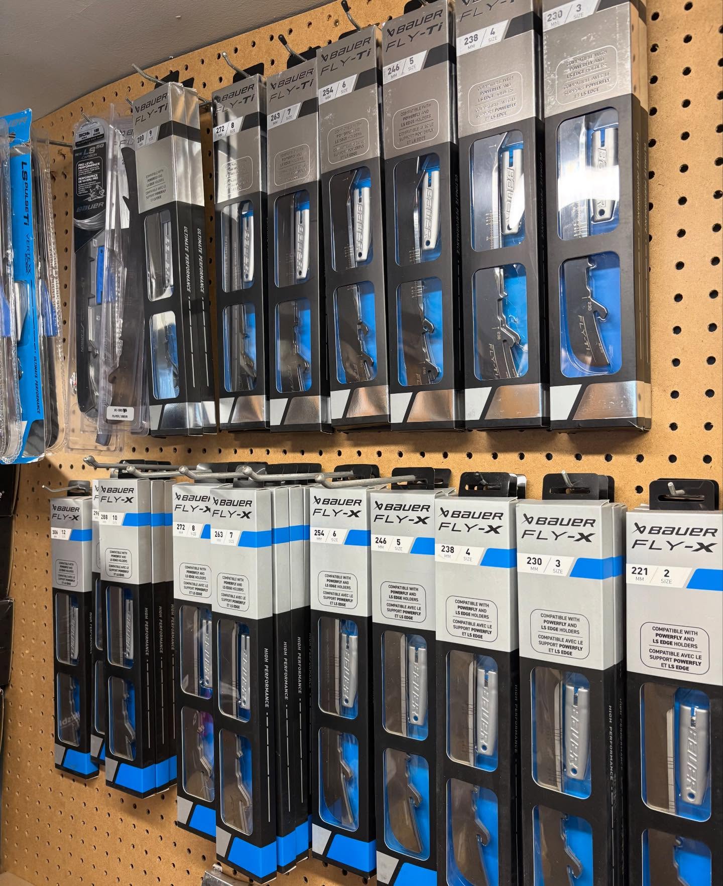 Packaged replacement skate runners on display at Skate Tech